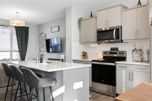 277 Ellen Way, Crossfield, AB - Indoor Photo Showing Kitchen With Upgraded Kitchen