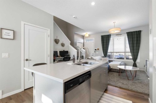 277 Ellen Way, Crossfield, AB - Indoor Photo Showing Kitchen With Double Sink