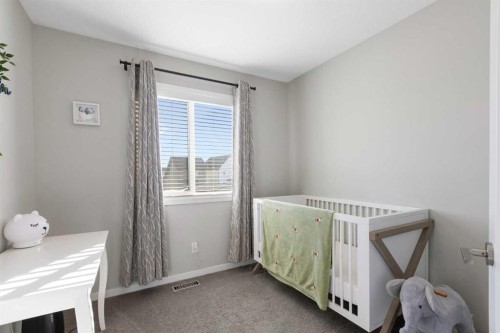 277 Ellen Way, Crossfield, AB - Indoor Photo Showing Bedroom