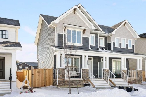 277 Ellen Way, Crossfield, AB - Outdoor With Deck Patio Veranda With Facade