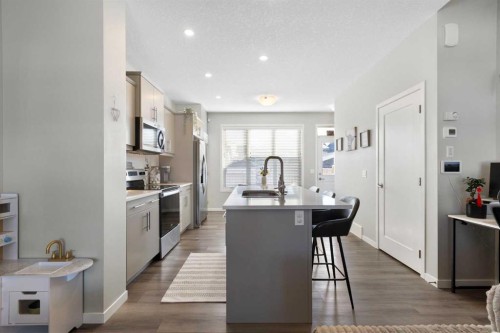 277 Ellen Way, Crossfield, AB - Indoor Photo Showing Kitchen With Upgraded Kitchen