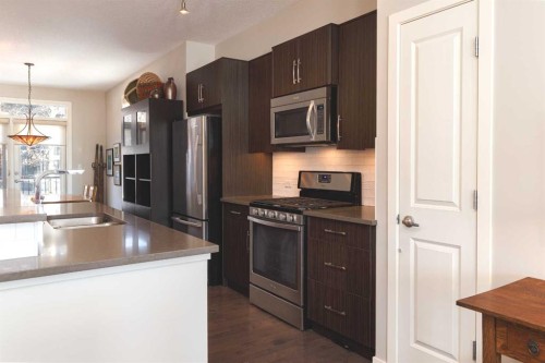 513 Ascot Circle Sw, Calgary, AB - Indoor Photo Showing Kitchen With Stainless Steel Kitchen