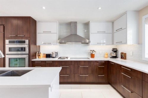 16 Silvercreek Place Nw, Calgary, AB - Indoor Photo Showing Kitchen With Stainless Steel Kitchen With Upgraded Kitchen