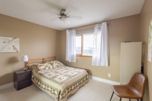 16 Silvercreek Place Nw, Calgary, AB - Indoor Photo Showing Bedroom