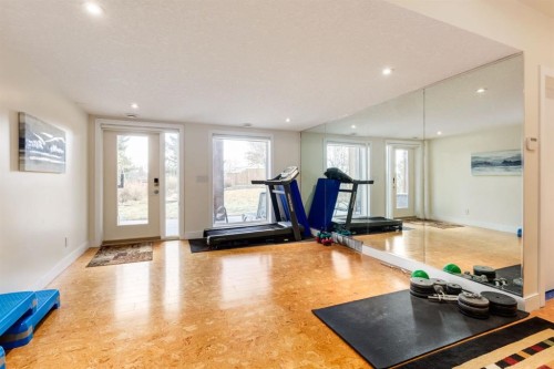 16 Silvercreek Place Nw, Calgary, AB - Indoor Photo Showing Gym Room
