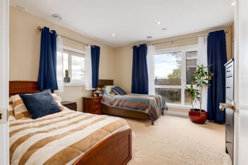16 Silvercreek Place Nw, Calgary, AB - Indoor Photo Showing Bedroom