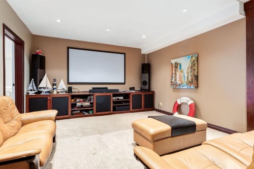 16 Silvercreek Place Nw, Calgary, AB - Indoor Photo Showing Living Room