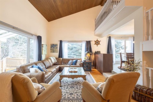 16 Silvercreek Place Nw, Calgary, AB - Indoor Photo Showing Living Room