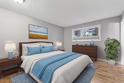 740 Lysander Drive Se, Calgary, AB - Indoor Photo Showing Bedroom
