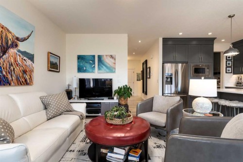 23 Cranbrook Green Se, Calgary, AB - Indoor Photo Showing Living Room