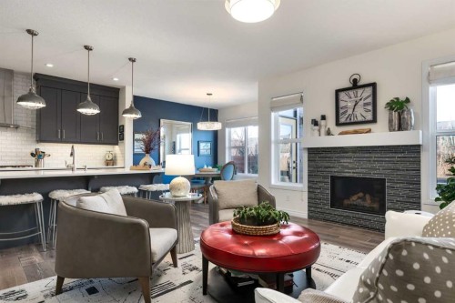 23 Cranbrook Green Se, Calgary, AB - Indoor Photo Showing Living Room With Fireplace