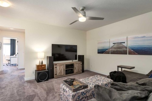 23 Cranbrook Green Se, Calgary, AB - Indoor Photo Showing Living Room