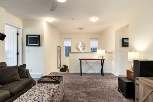 23 Cranbrook Green Se, Calgary, AB - Indoor Photo Showing Living Room
