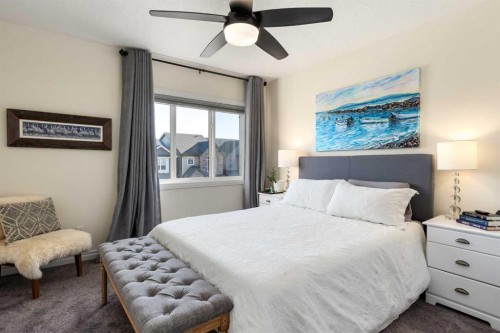 23 Cranbrook Green Se, Calgary, AB - Indoor Photo Showing Bedroom