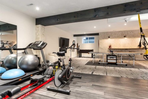 23 Cranbrook Green Se, Calgary, AB - Indoor Photo Showing Gym Room