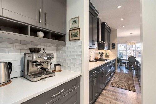 23 Cranbrook Green Se, Calgary, AB - Indoor Photo Showing Kitchen With Upgraded Kitchen