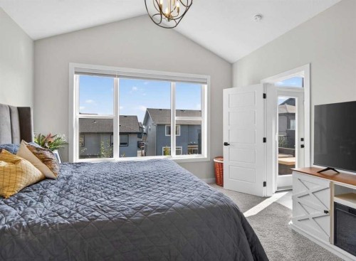 184 Precedence Hill, Cochrane, AB - Indoor Photo Showing Bedroom