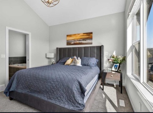 184 Precedence Hill, Cochrane, AB - Indoor Photo Showing Bedroom