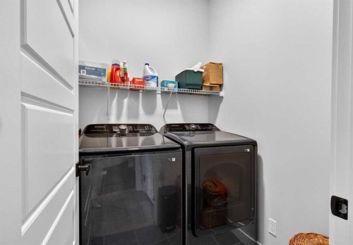184 Precedence Hill, Cochrane, AB - Indoor Photo Showing Laundry Room