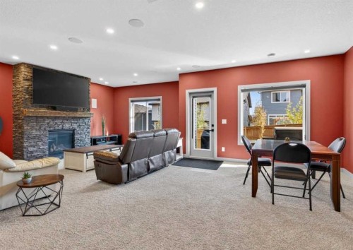 184 Precedence Hill, Cochrane, AB - Indoor With Fireplace