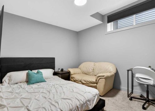 184 Precedence Hill, Cochrane, AB - Indoor Photo Showing Bedroom