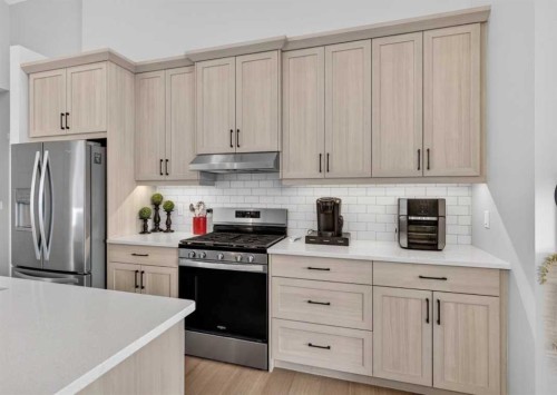 184 Precedence Hill, Cochrane, AB - Indoor Photo Showing Kitchen