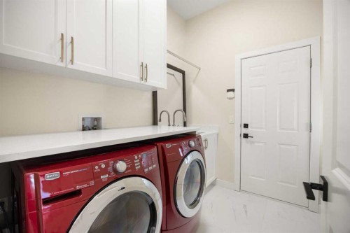 271 Hamptons Terrace Nw, Calgary, AB - Indoor Photo Showing Laundry Room