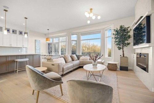 271 Hamptons Terrace Nw, Calgary, AB - Indoor Photo Showing Living Room With Fireplace
