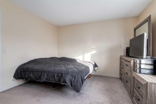 150 Martinbrook Road Ne, Calgary, AB - Indoor Photo Showing Bedroom