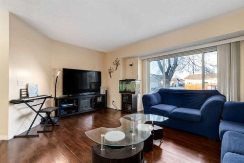 150 Martinbrook Road Ne, Calgary, AB - Indoor Photo Showing Living Room