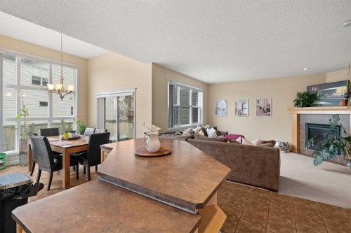 137 Copperleaf Bay Se, Calgary, AB - Indoor With Fireplace