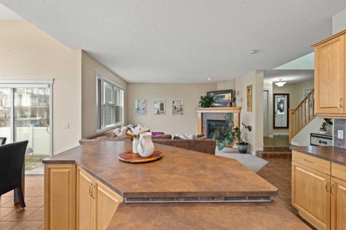 137 Copperleaf Bay Se, Calgary, AB - Indoor With Fireplace