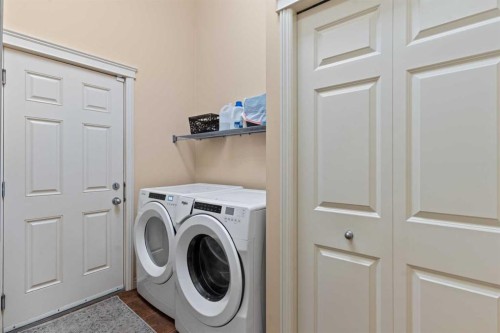 137 Copperleaf Bay Se, Calgary, AB - Indoor Photo Showing Laundry Room