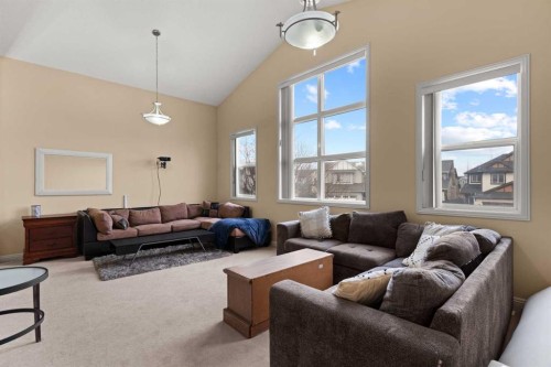 137 Copperleaf Bay Se, Calgary, AB - Indoor Photo Showing Living Room