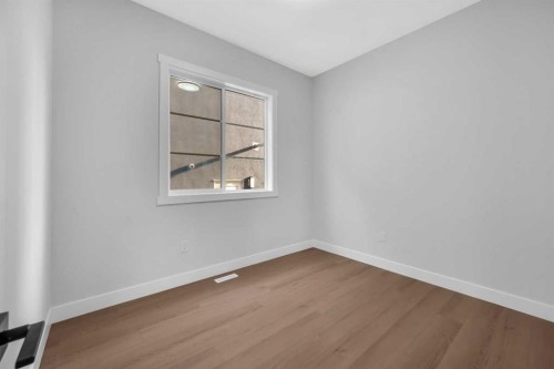 203 Kinniburgh Place, Chestermere, AB - Indoor Photo Showing Other Room