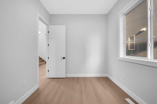 203 Kinniburgh Place, Chestermere, AB - Indoor Photo Showing Other Room