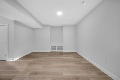 203 Kinniburgh Place, Chestermere, AB - Indoor Photo Showing Other Room