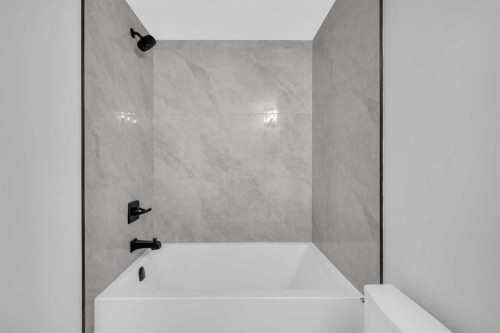 203 Kinniburgh Place, Chestermere, AB - Indoor Photo Showing Bathroom