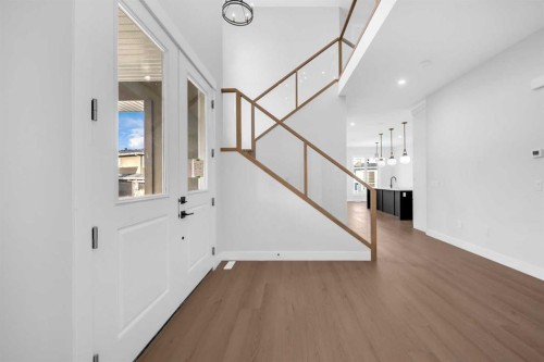 203 Kinniburgh Place, Chestermere, AB - Indoor Photo Showing Other Room