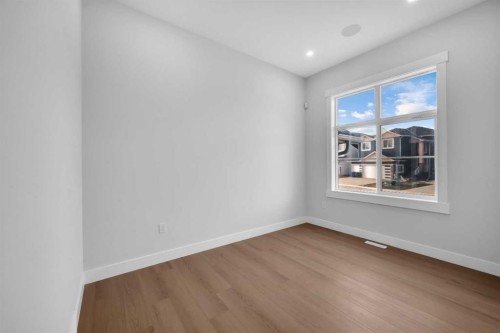 203 Kinniburgh Place, Chestermere, AB - Indoor Photo Showing Other Room