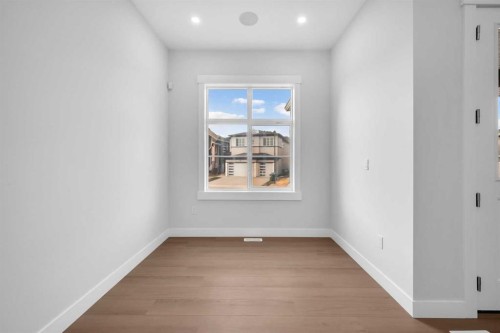 203 Kinniburgh Place, Chestermere, AB - Indoor Photo Showing Other Room