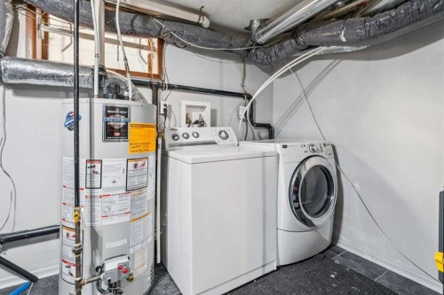 1816 42 Street Se, Calgary, AB - Indoor Photo Showing Laundry Room