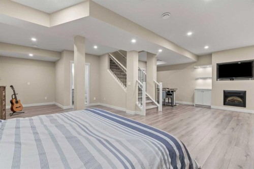 2306 Bayside Circle Sw, Airdrie, AB - Indoor With Fireplace