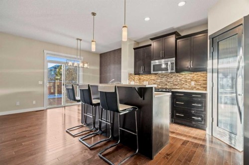 2306 Bayside Circle Sw, Airdrie, AB - Indoor Photo Showing Kitchen With Upgraded Kitchen