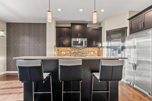 2306 Bayside Circle Sw, Airdrie, AB - Indoor Photo Showing Kitchen With Upgraded Kitchen