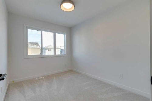 2413 Creeker Lane, Airdrie, AB - Indoor Photo Showing Other Room