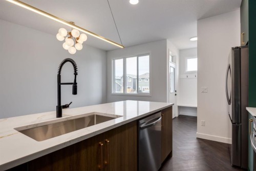 291 Sora Boulevard Se, Calgary, AB - Indoor Photo Showing Kitchen