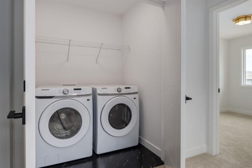 291 Sora Boulevard Se, Calgary, AB - Indoor Photo Showing Laundry Room