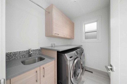 4906 21 Street Sw, Calgary, AB - Indoor Photo Showing Laundry Room