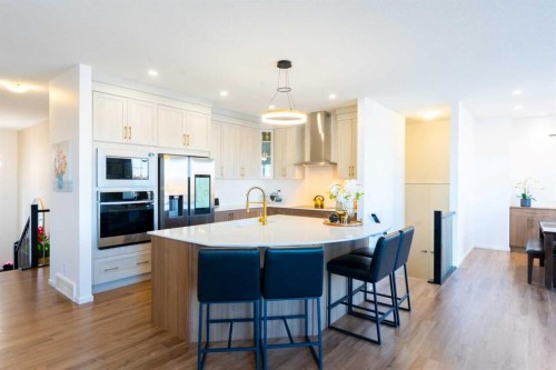 228 Windrow Link Sw, Airdrie, AB - Indoor Photo Showing Kitchen With Upgraded Kitchen